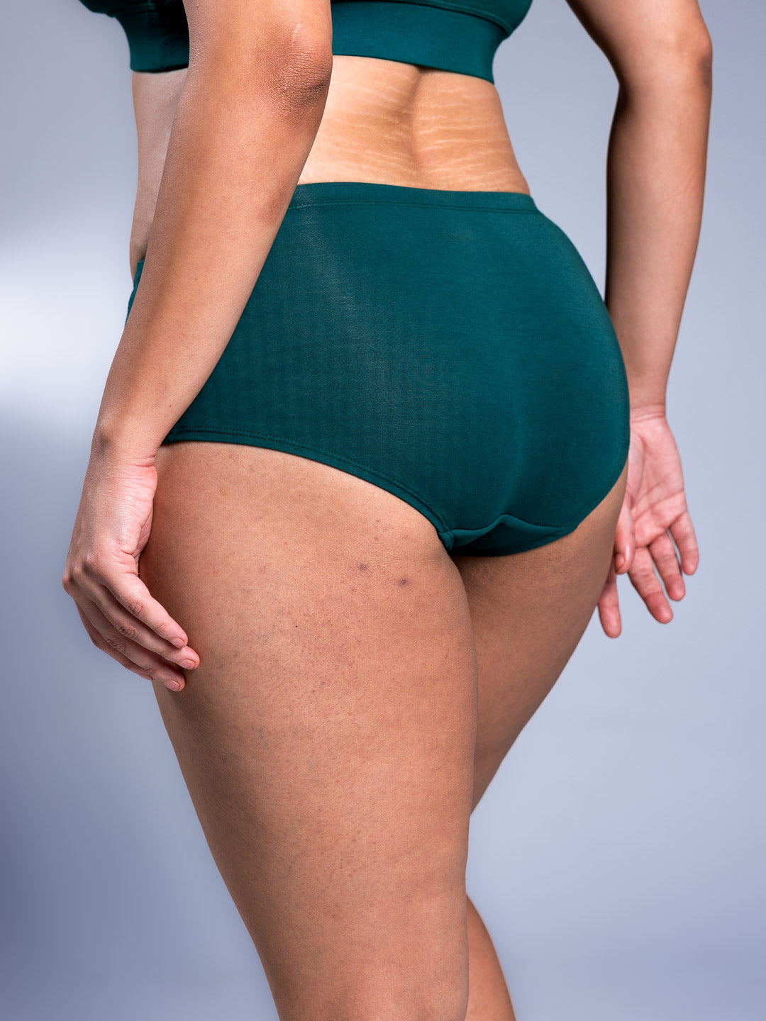 Women Bare Hipsters Racing Green Back Close Up